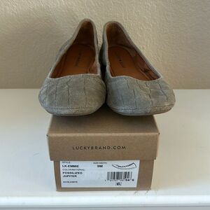 Women’s Lucky tan slip on shoes side 9.